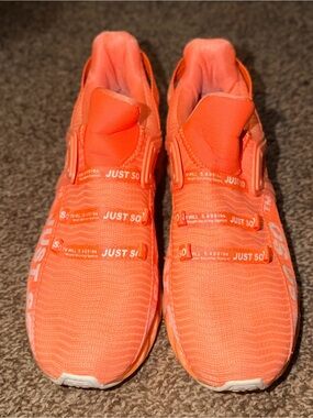 Women’s “Just So So” orange athletic shoes size 9